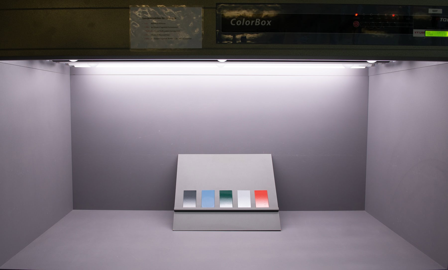 Photography booth with test specimens for documentation purposes