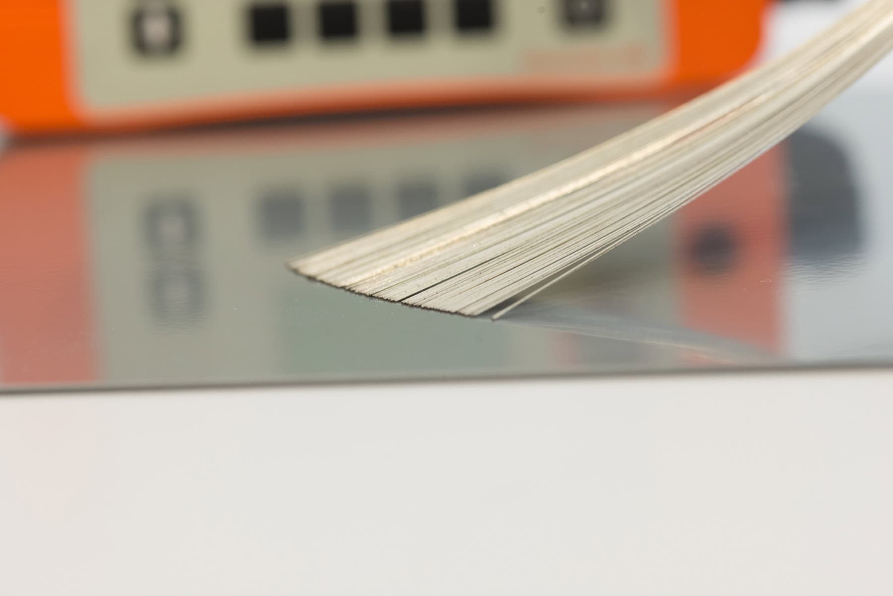 Porosity testing using a brush electrode